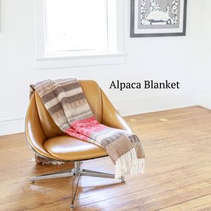 warm alpaca wool southwestern red blanket on chair
