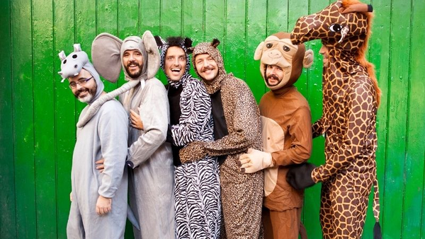 A group of men dressed in animal onesies for an animal-themed group Halloween costume.