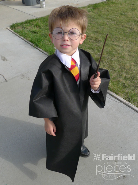 A child wearing a DIY Hogwarts Uniform Halloween costumes.