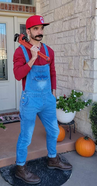 A man wearing a DIY Mario Halloween Costume.
