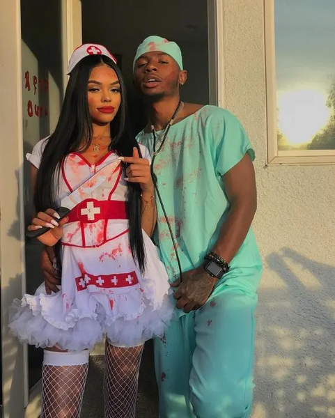 Couples costume featuring a couple dressed as a sexy doctor and sexy nurse.