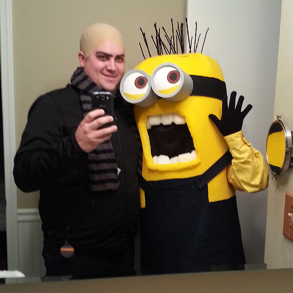 Couples costume featuring a couple dressed as Gru and a Minion from Dispicable Me.