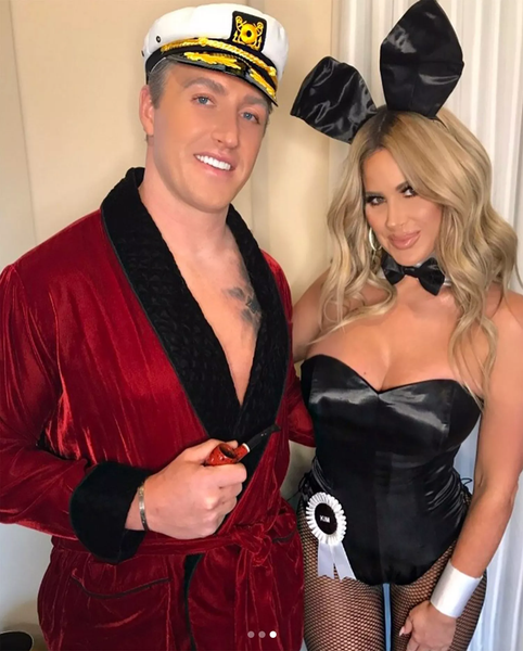 Couples costume featuring a couple dressed as Hugh Hefner and a Playboy Bunny.