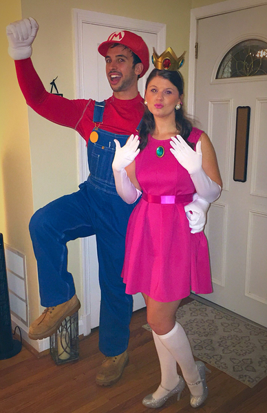 Couples costume featuring a couple dressed as Mario and Princess Peach from the Nintendo video games.