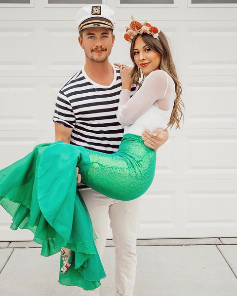 Couples costume featuring a couple dressed as a sailor and a mermaid.