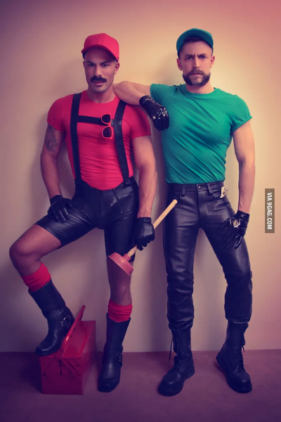 Two men dressed in Sexy Mario and Sexy Luigi Halloween costumes.