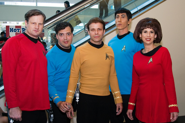 A group of people wearing Star Trek Halloween costumes.