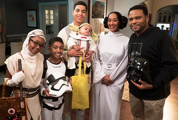 A family of six dressed in a Star Wars group Halloween costume.