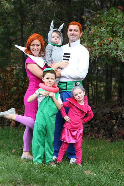 A family dressed in The Jetsons Halloween costumes, featuring Jane, Judy, George, and Elroy Jetson.