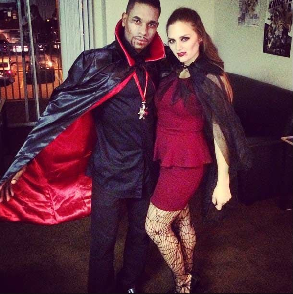 Couples costume featuring two people dressed as vampires.