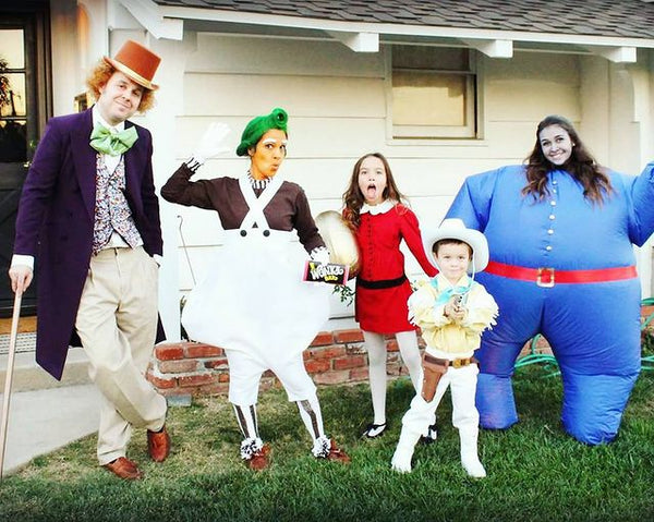 A family of six dressed in a Willy Wonka group Halloween costume.