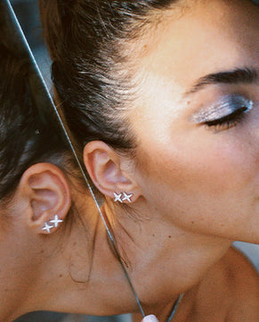 valentina cabassi wearing APM Monaco Stars Ear cuff with Chain and Studs