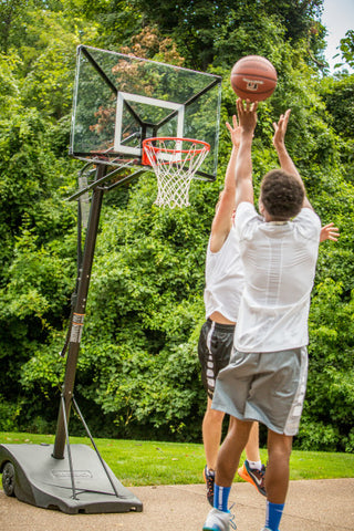 Boys playing basketball on a Goalsetter hoop