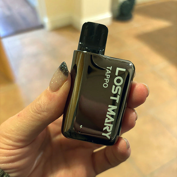 A Lost Mary Tappo Pod Kit device held in a hand