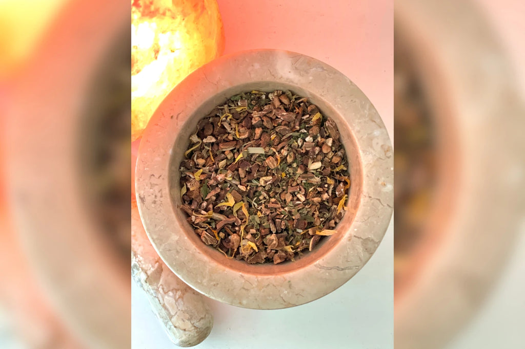 Glow Dandelion and Burdock Root Tea in Pestle and Mortar