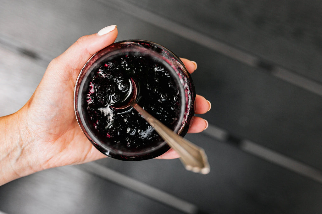 fruit tea in a cup with a spoon