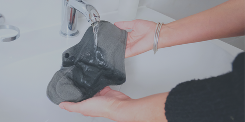 rinsing a reusable period pad