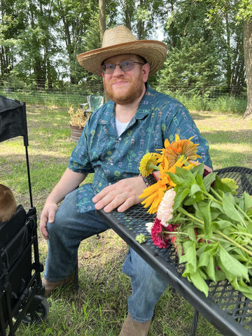 Man wearing Geek Tropical botany Hawaiian cuban collar shirt in the garden