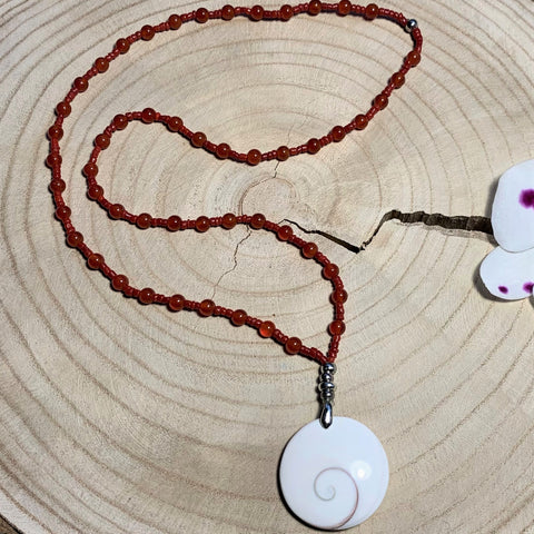Carnelian necklace and eye of Saint Lucia
