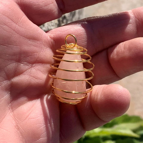 Caged rose quartz pendant