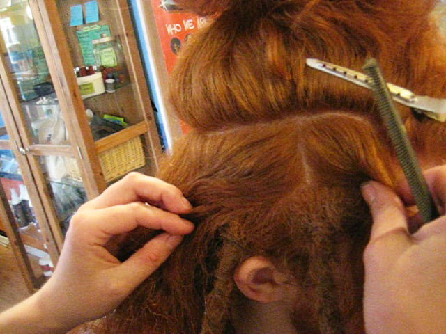 tied-up and partially dreadlocked hair sectioned to show bricklaying square sectioning pattern