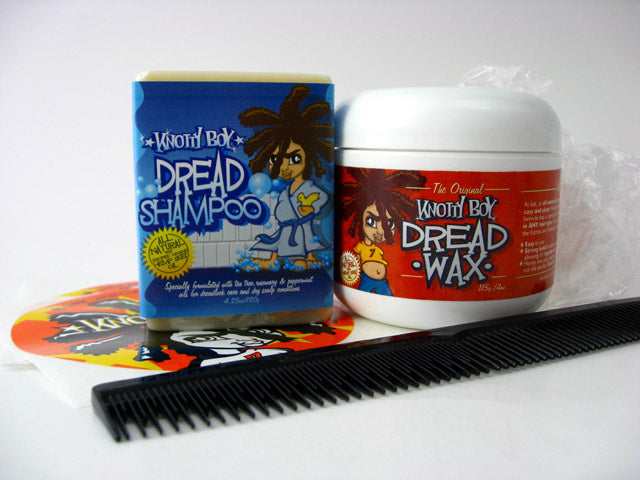 knotty boy basic dreadlock starter kit showing two stickers a dreadlock comb a bar of dreadlock shampoo and a 4 ounce tub of dreadlock wax