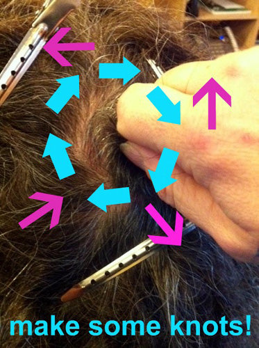 close up of resectioned hair with arrows indicating circular rubbing motion to accumulate loose hair 