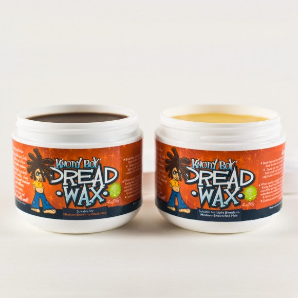 image of side-by-side dreadlock wax jars with lids removed showing one light and one dark wax