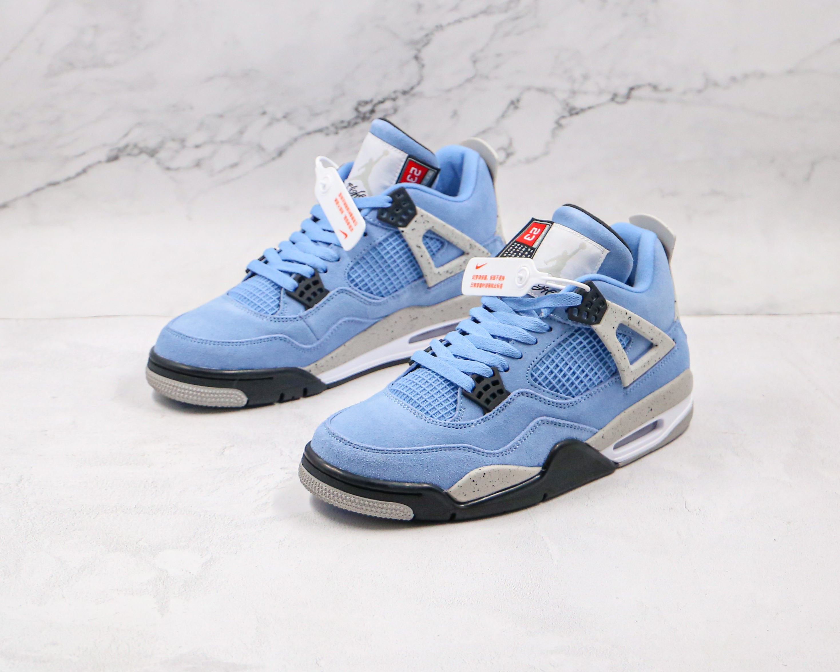 Jordan 4 Retro University Blue CT8527-400 Sneakers