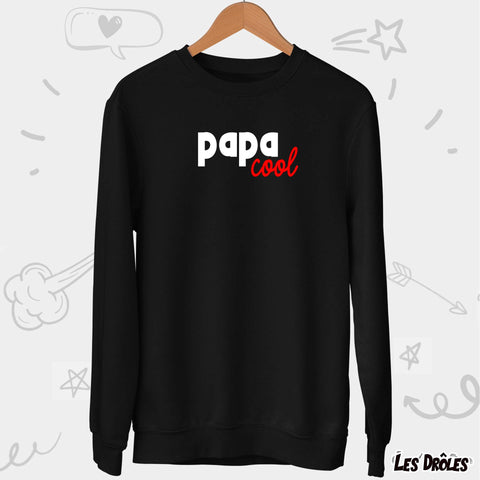 Pull "Papa Cool" bien plié, illustrant la qualité du tricot et la précision