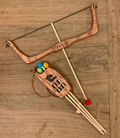 Handcrafted children's wooden bow and arrow with quiver toy.