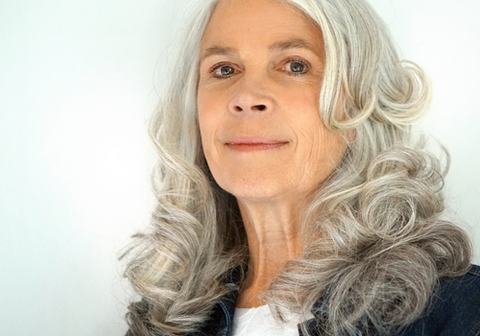 Stylish Woman With Curly Grey Hair 