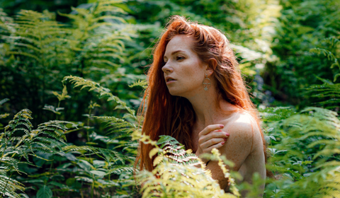 Redhead Woman In Nature Showing Natural Beauty