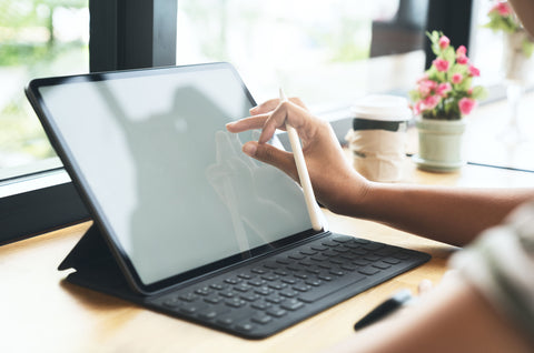 iPad with keyboard and Apple Pencil for surface pattern design