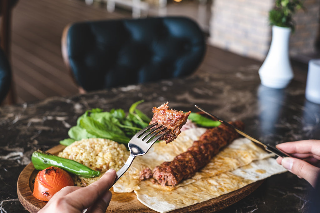 beef liver on a fork