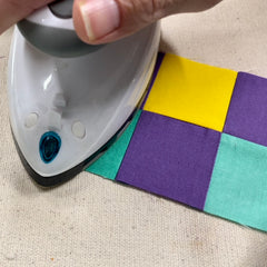 sewing and piecing a quilt block tutorial by Cristy Fincher