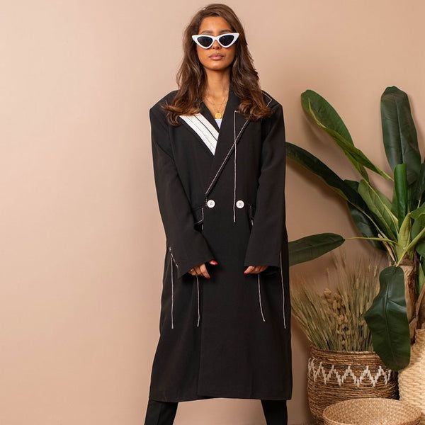 Dramatic Ruffle Shoulder Trench Coat