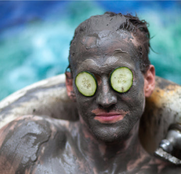 man with mud mask