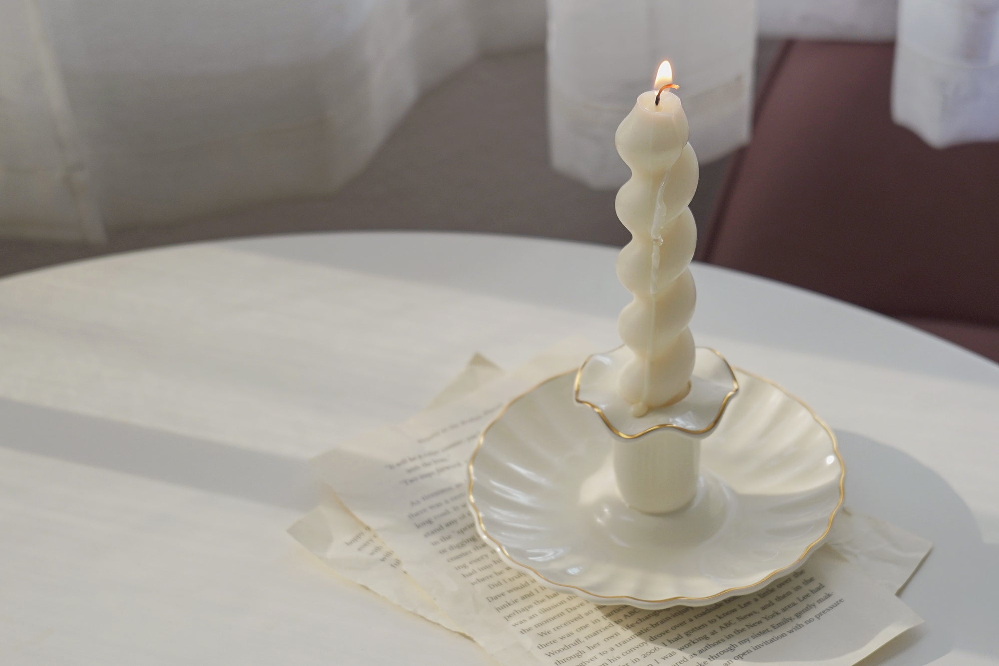 wavy candle in a vintage ruffle taper candle holder