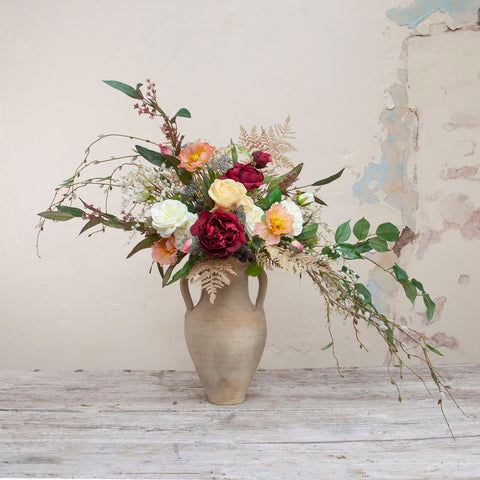 RHS PEONIES, ROSES AND POPPIES IN A LARGE TUNISIAN URN