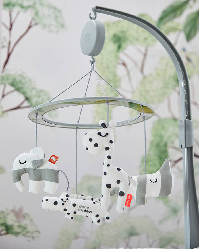 Done by Deer musical mirror mobile toy from Done by Deer in neutral colours 