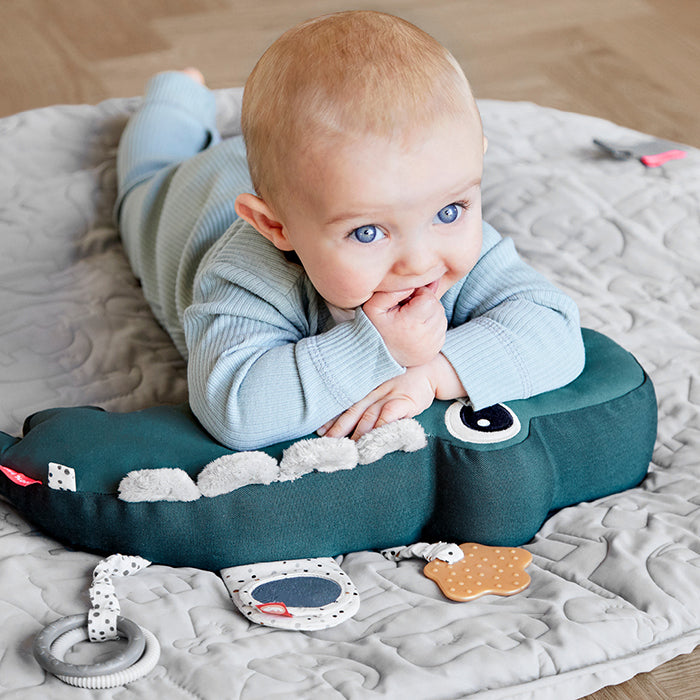 Croco tummy time pillow let your baby enjoy tummy time with sensory features