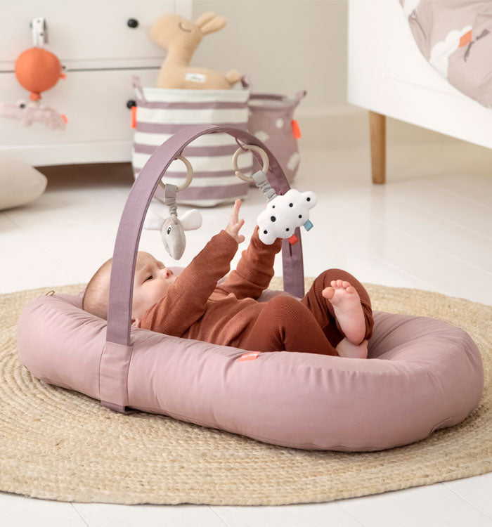 Child lying in a cozy lounger