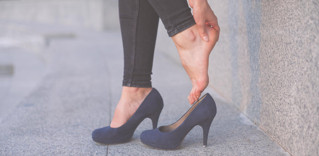 Woman wearing heels, heels causing foot discomfort