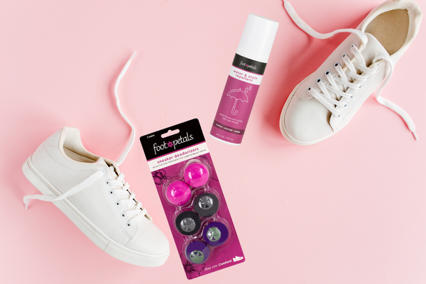 White canvas shoes with Foot Petals shoe spray and shoe deodorizers