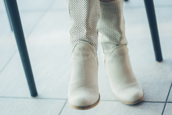 Dirty white leather boots