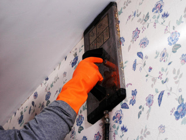Use steamer to remove wallpaper