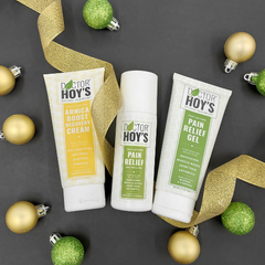 Doctor Hoy’s arnica cream and natural pain relief topicals with holiday decorations