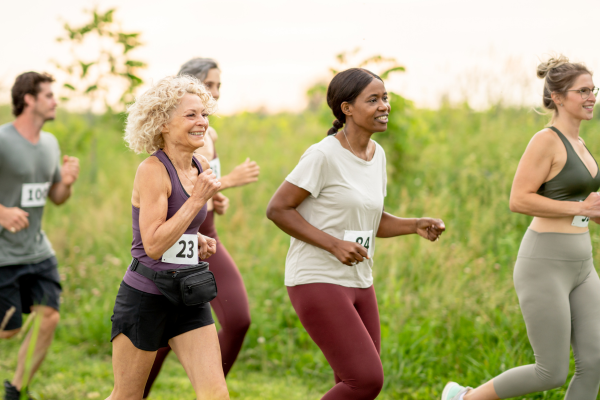 Group of people running a half marathon outside