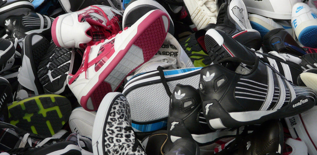 Pile of sneakers and athletic shoes